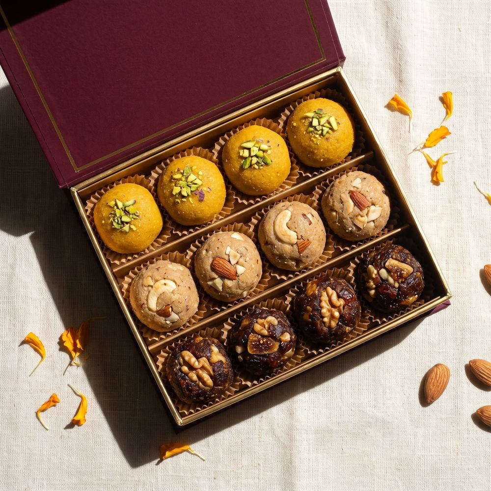 Khandaani Box: besan, aata gond and dates dry fruit laddoos
